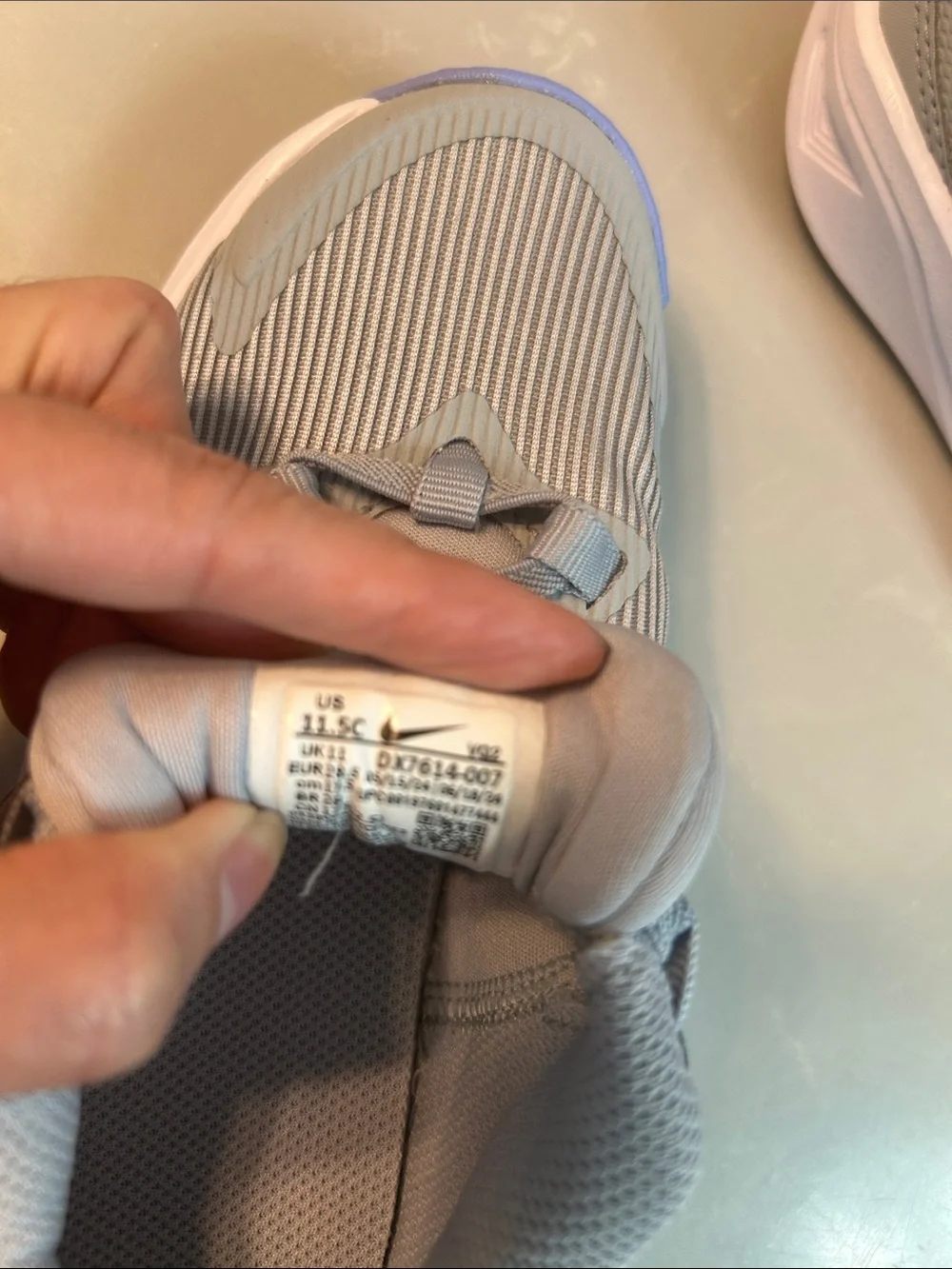 Nike Kids Grey Sneakers with Blue Swoosh